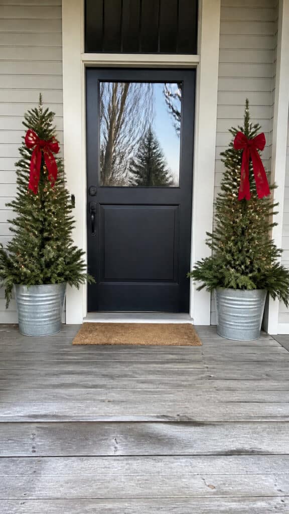 Flank Your Door with Matching Potted Evergreens